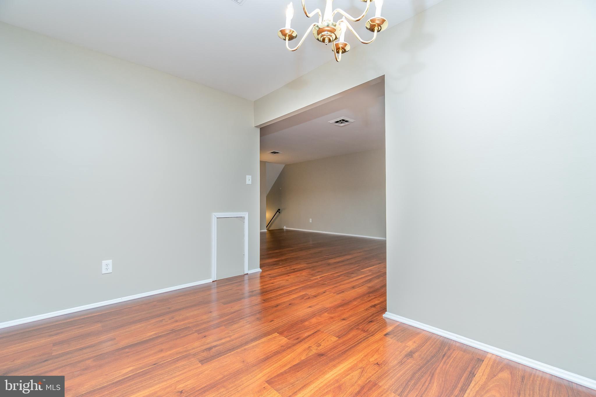 411 Conestoga Road, Unit 22 Devon, PA 19333 - Photo 12 of 27 a view of an empty room with wooden floor