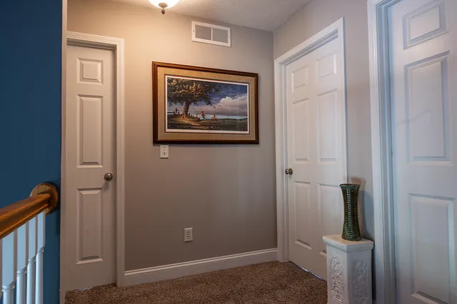 a view of a hallway with elevator