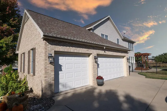 a view of a house with a garage
