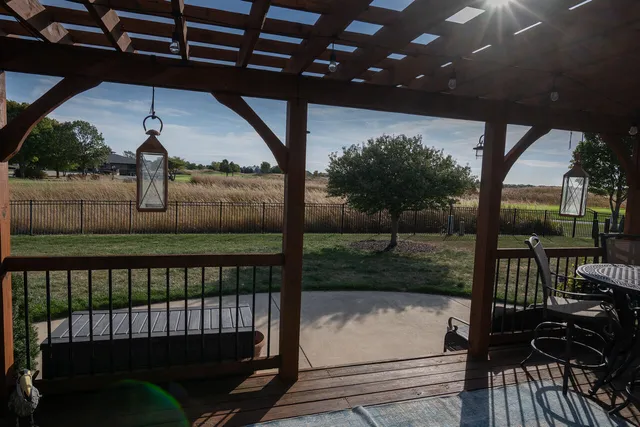 a view of a porch with a yard