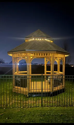 a front view of a house having a yard