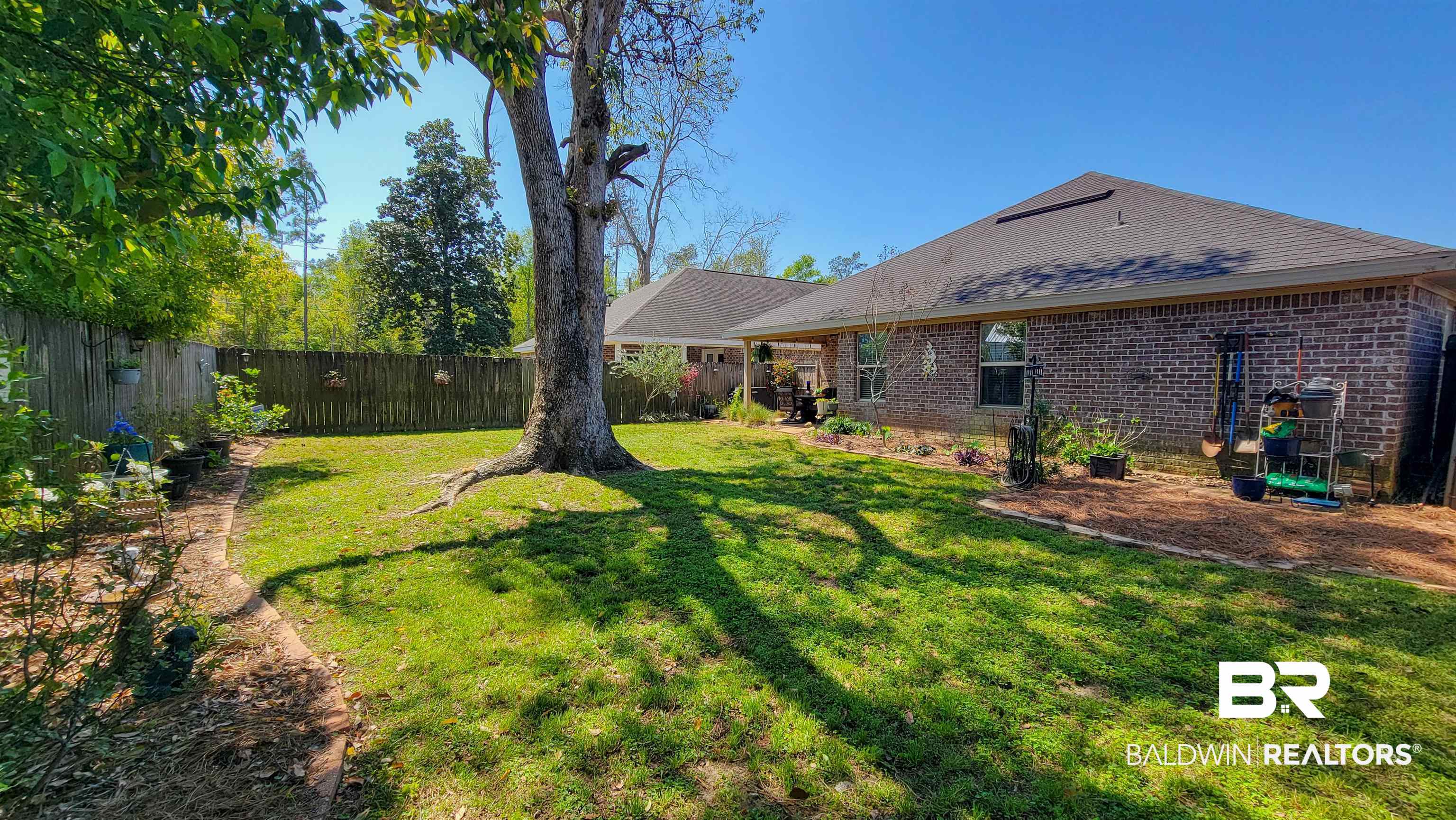 1304 Majesty Loop Foley, AL 36535 - Photo 29 of 44 View of fenced backyard