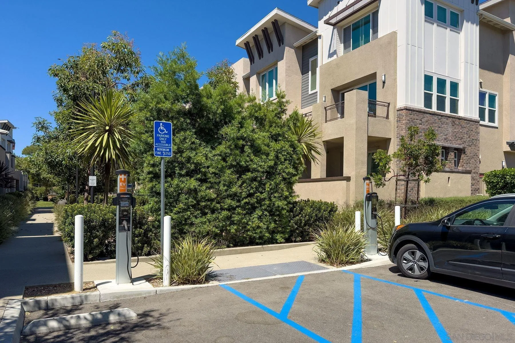 6058 Colt Place, Unit 101 Carlsbad, CA 92009 - Photo 42 of 42 a view of a street with cars