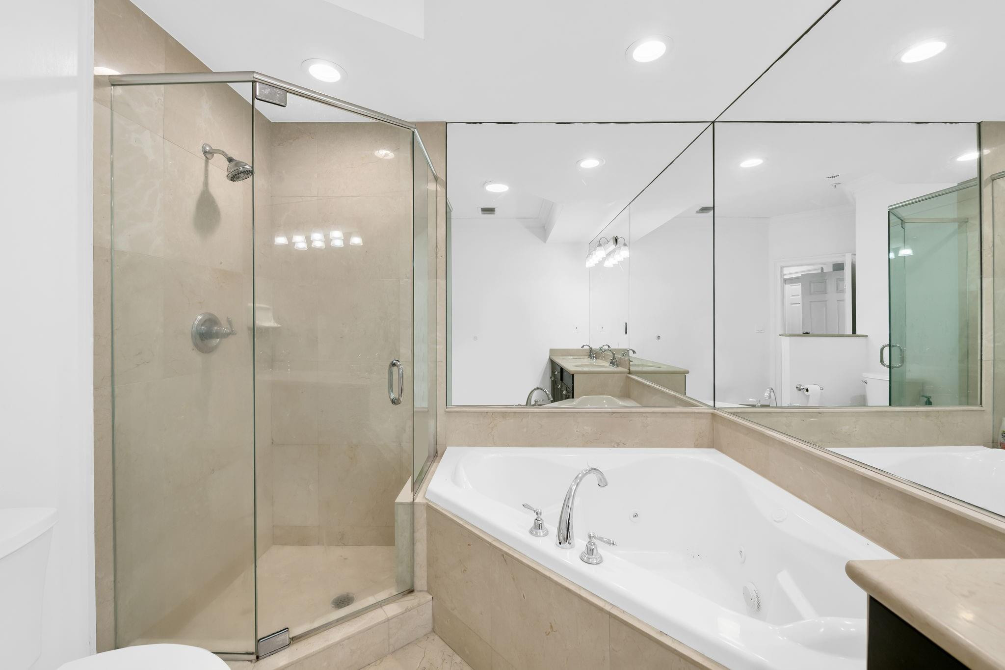 456 East Boca Raton Road Boca Raton, FL 33432 - Photo 29 of 33 a bathroom with a bathtub and a shower