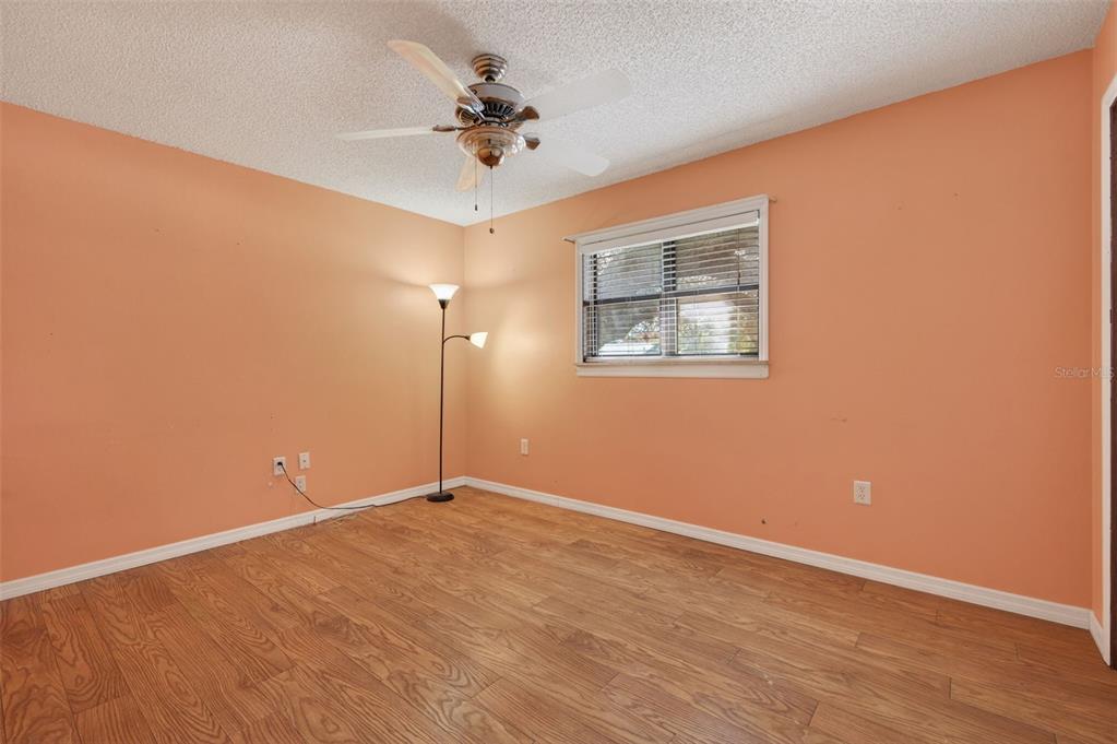 7157 Landmark Drive Spring Hill, FL 34606 - Photo 26 of 57 a view of an empty room with a window