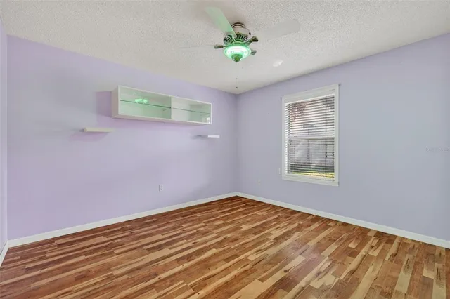 a view of a big room with wooden floor