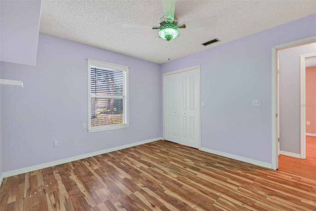 7157 Landmark Drive Spring Hill, FL 34606 - Photo 31 of 57 a view of an empty room with a window