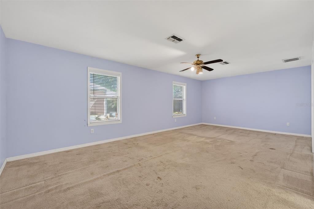 7157 Landmark Drive Spring Hill, FL 34606 - Photo 36 of 57 a view of an empty room with a window