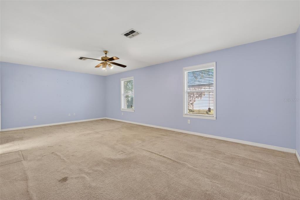 7157 Landmark Drive Spring Hill, FL 34606 - Photo 38 of 57 a view of an empty room with a window