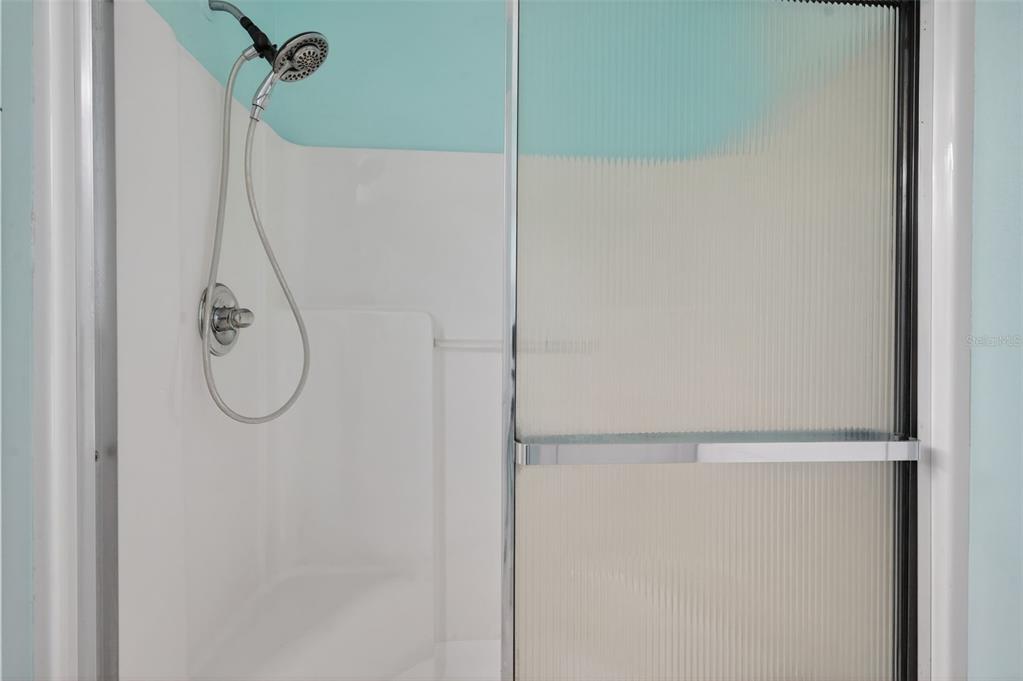 7157 Landmark Drive Spring Hill, FL 34606 - Photo 40 of 57 a bathroom with a shower