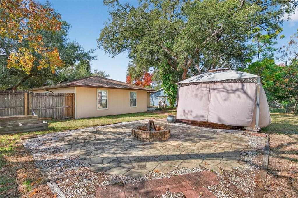 7157 Landmark Drive Spring Hill, FL 34606 - Photo 48 of 57 a backyard of a house