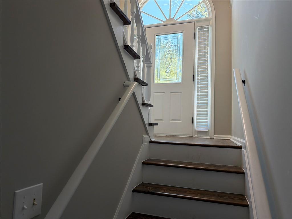 934 Bay Ridge Drive Lawrenceville, GA 30045 - Photo 73 of 78 a view of entryway with wooden floor and stairs