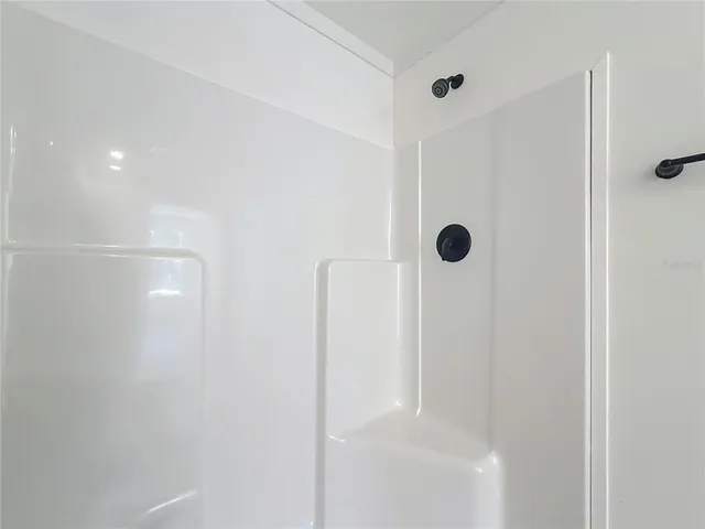 a view of a hallway with windows