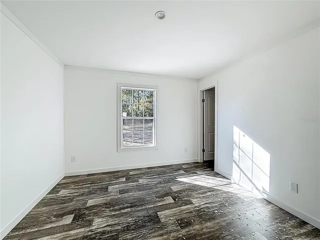 a view of a room that has a window in it