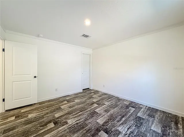 a view of a room with an empty space