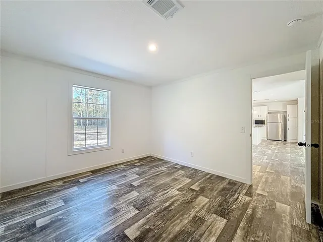 a view of a room with racks on the wall