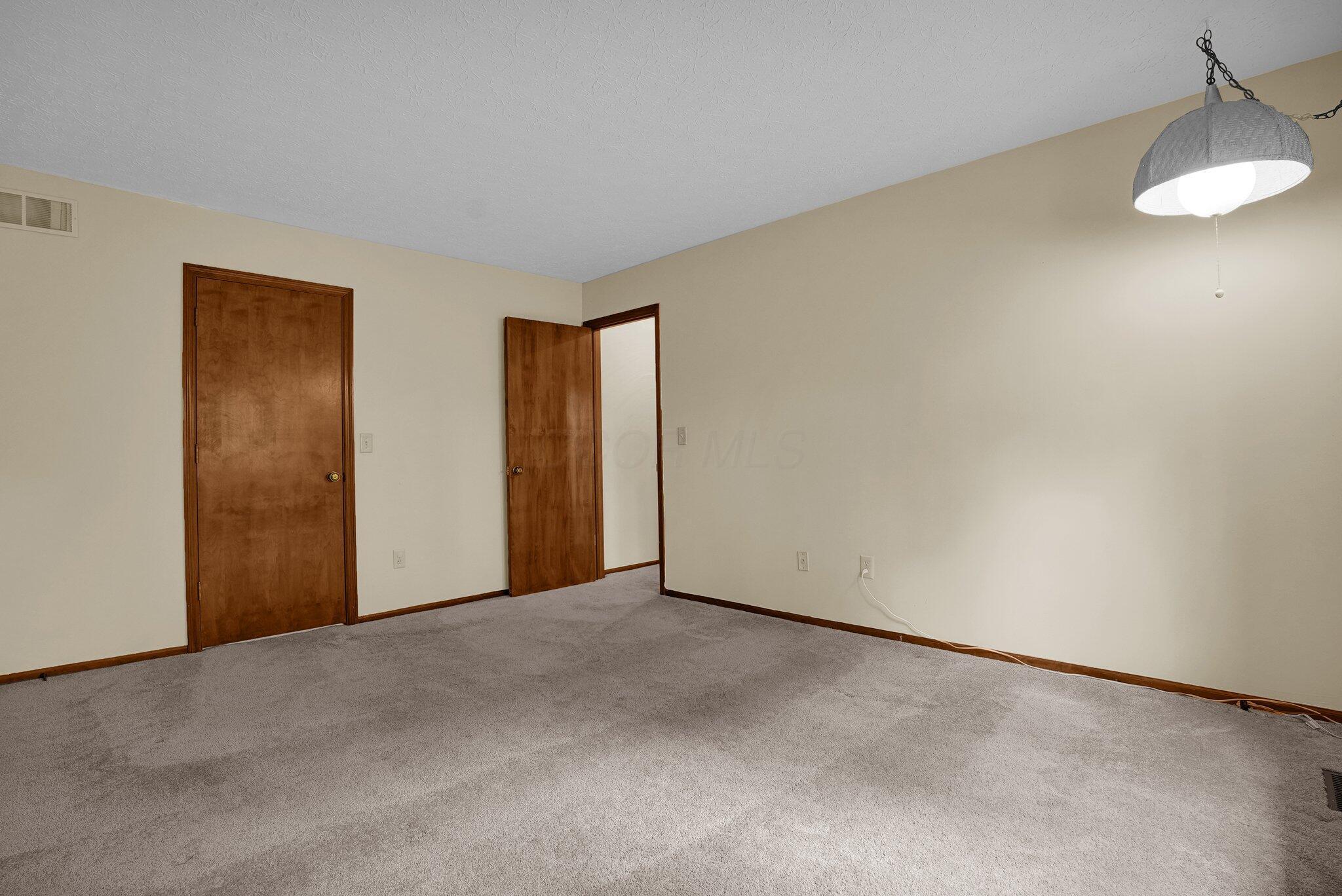 623 Rockbridge Road Westerville, OH 43081 - Photo 35 of 63 Bedroom #3: This bedroom overlooks the backyard and has a very large walk-in closet. Neutral decor and flooring carry into this room.
