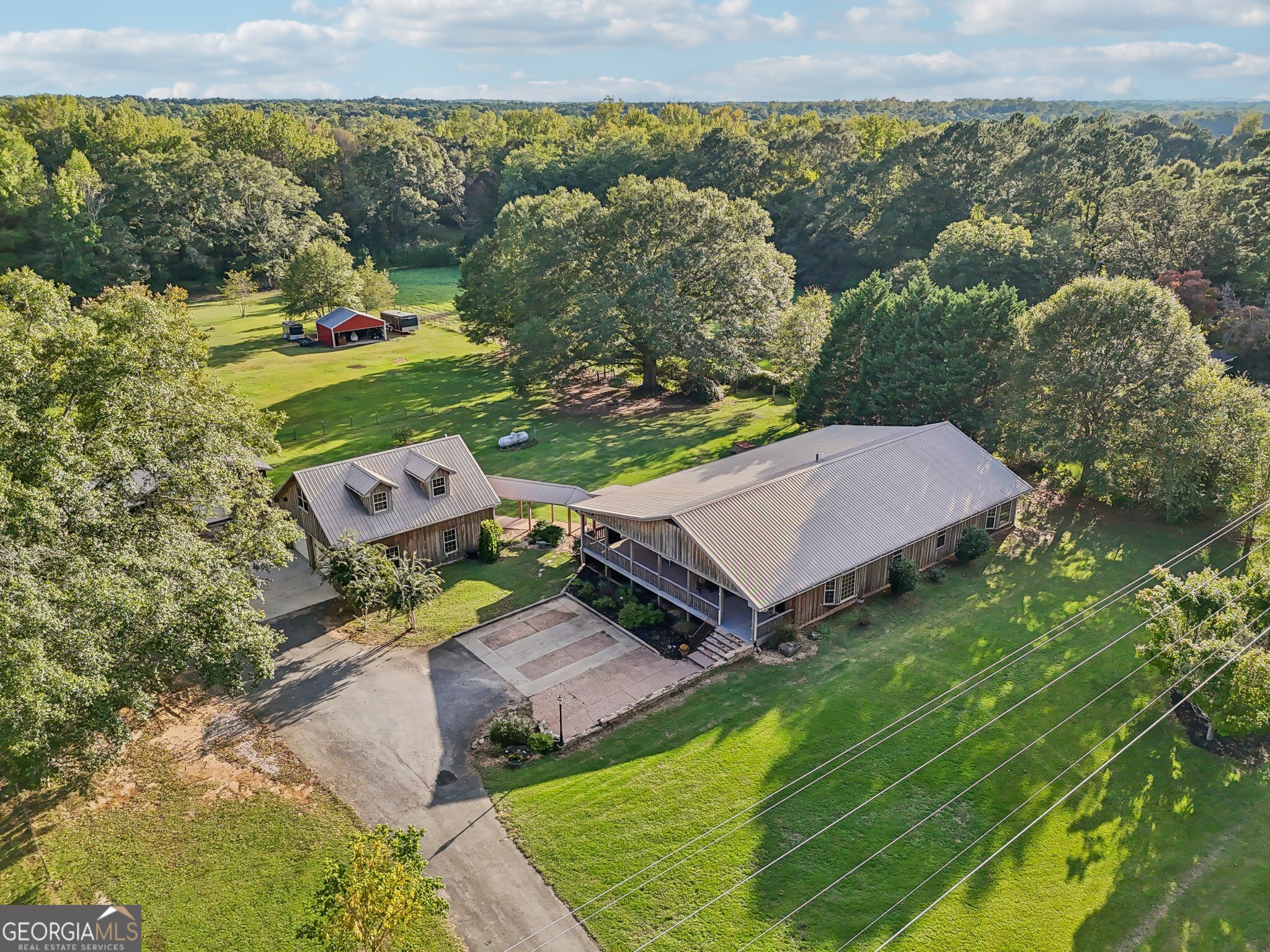 839 Manley Road Griffin, GA 30223 - Photo 1 of 1 an aerial view of a house with a yard basket ball court and outdoor seating