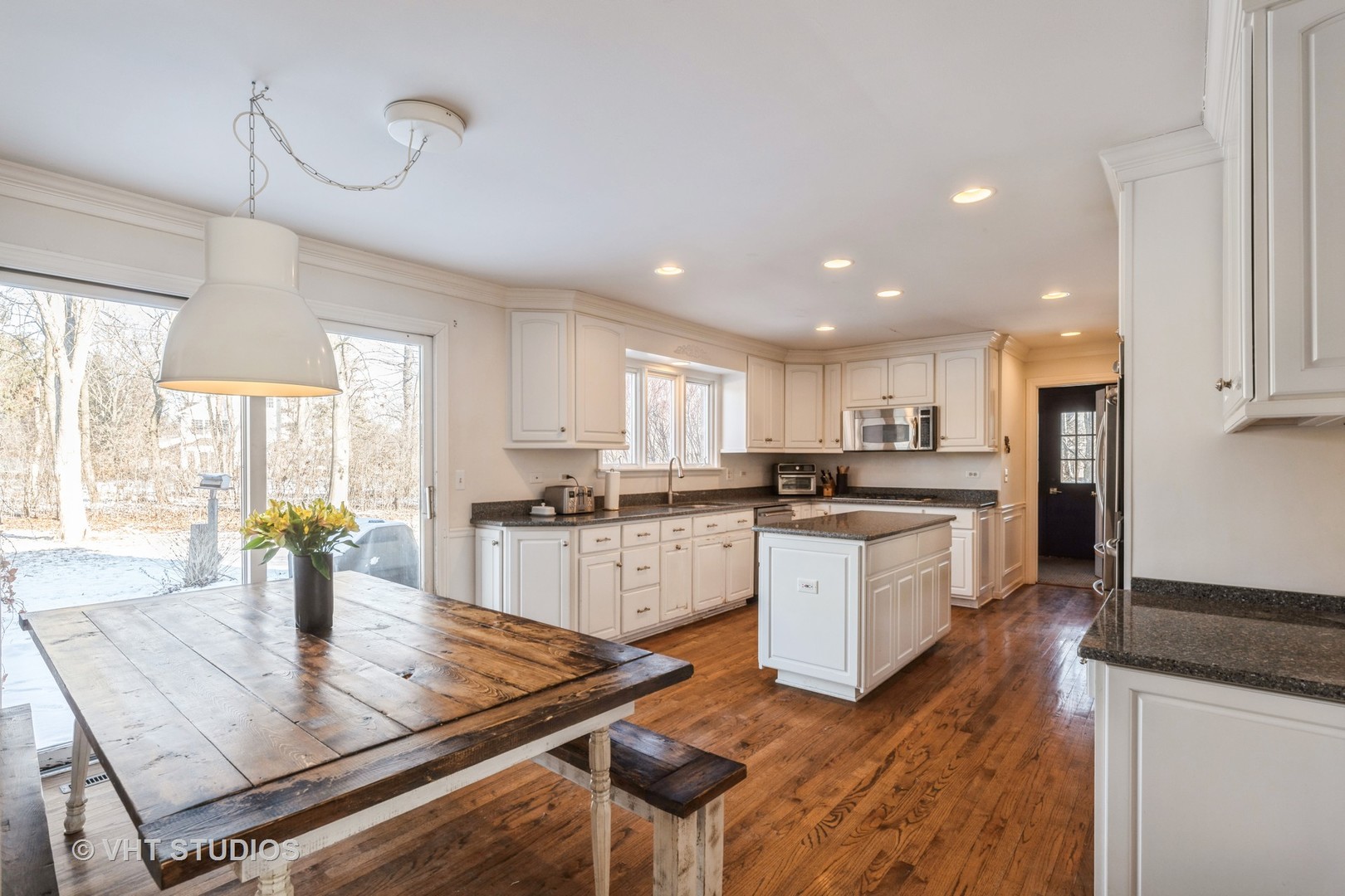 206 Warwick Road Lake Forest, IL 60045 - Photo 5 of 8 a kitchen with white cabinets and sink