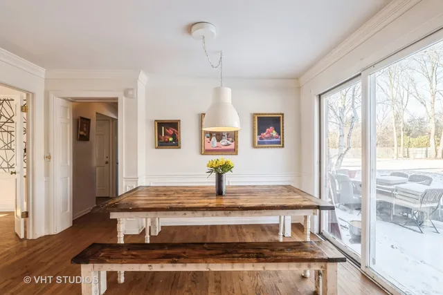a living room with kitchen island granite countertop furniture and a window