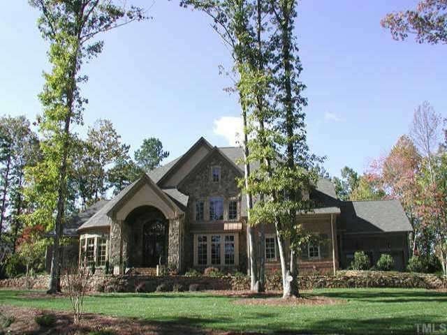 3124 Cone Manor Lane Raleigh, NC 27613 - Photo 1 of 10 a front view of a house with a garden