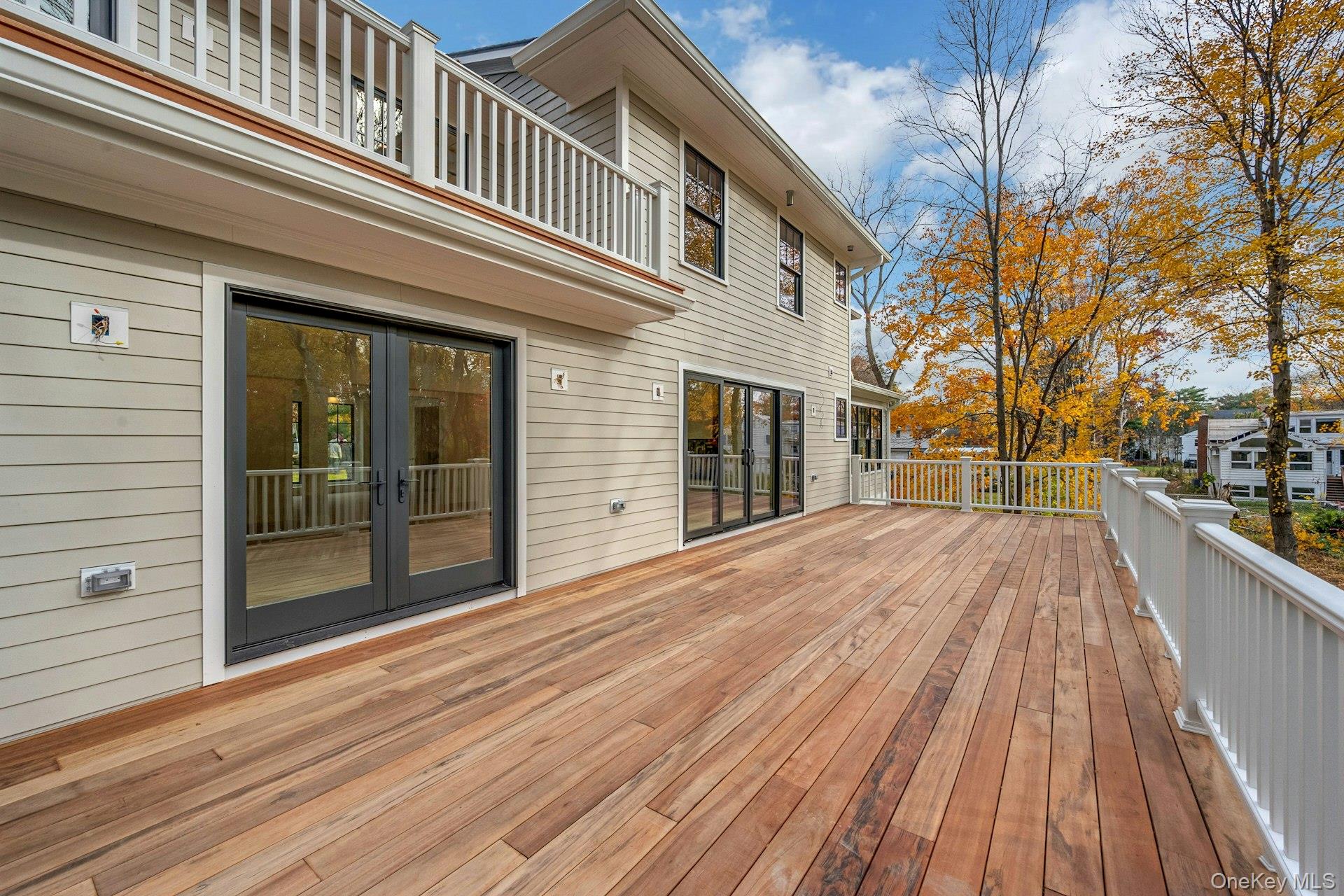 32 Sycamore Road Scarsdale, NY 10583 - Photo 12 of 50 View of expansive Cumaru wooden floor deck