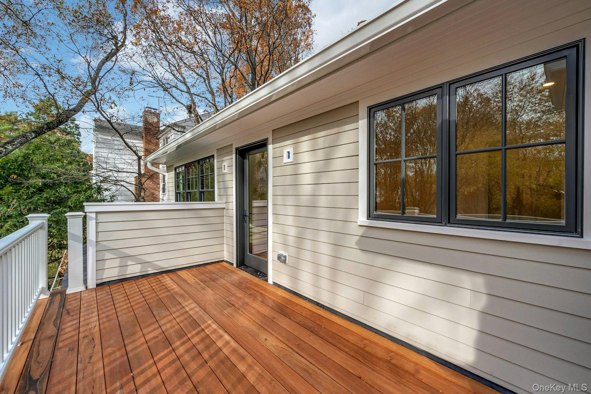 32 Sycamore Road Scarsdale, NY 10583 - Photo 16 of 48 View of deck off of primary bedrooms
