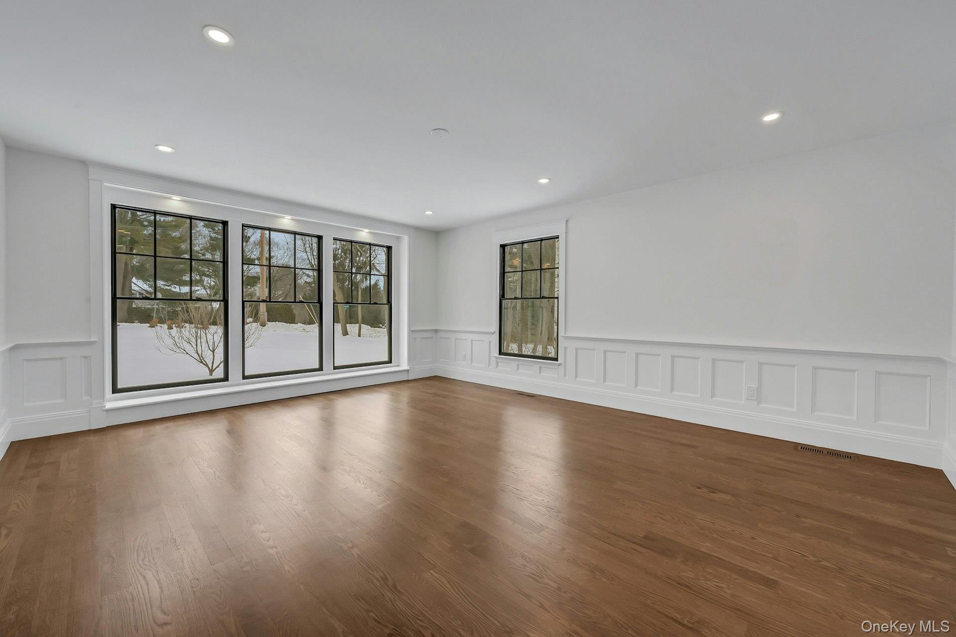 32 Sycamore Road Scarsdale, NY 10583 - Photo 17 of 48 Formal living room with coiffered walls.