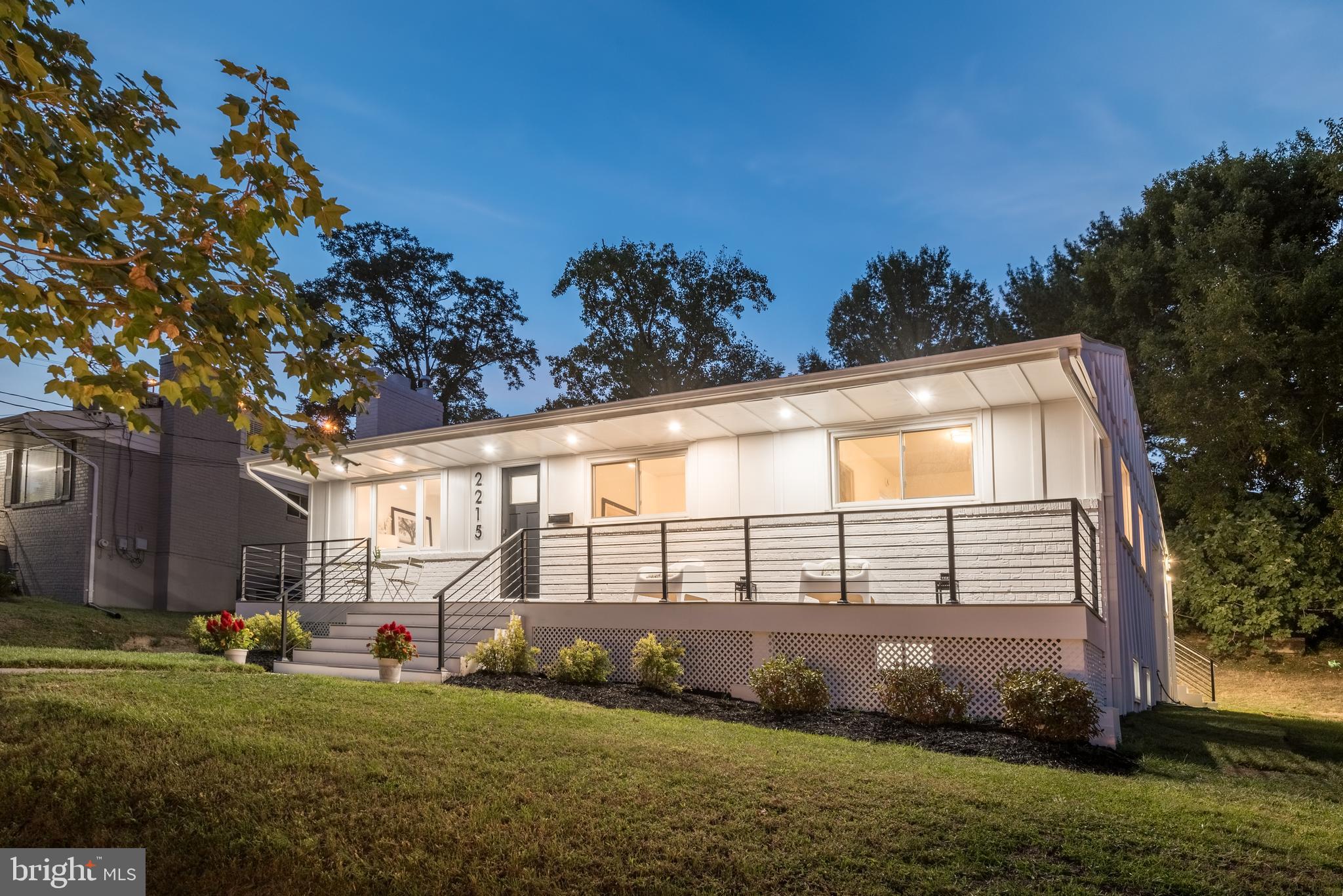 2215 Reedie Drive Silver Spring, MD 20902 - Photo 2 of 56 a front view of a house with a yard