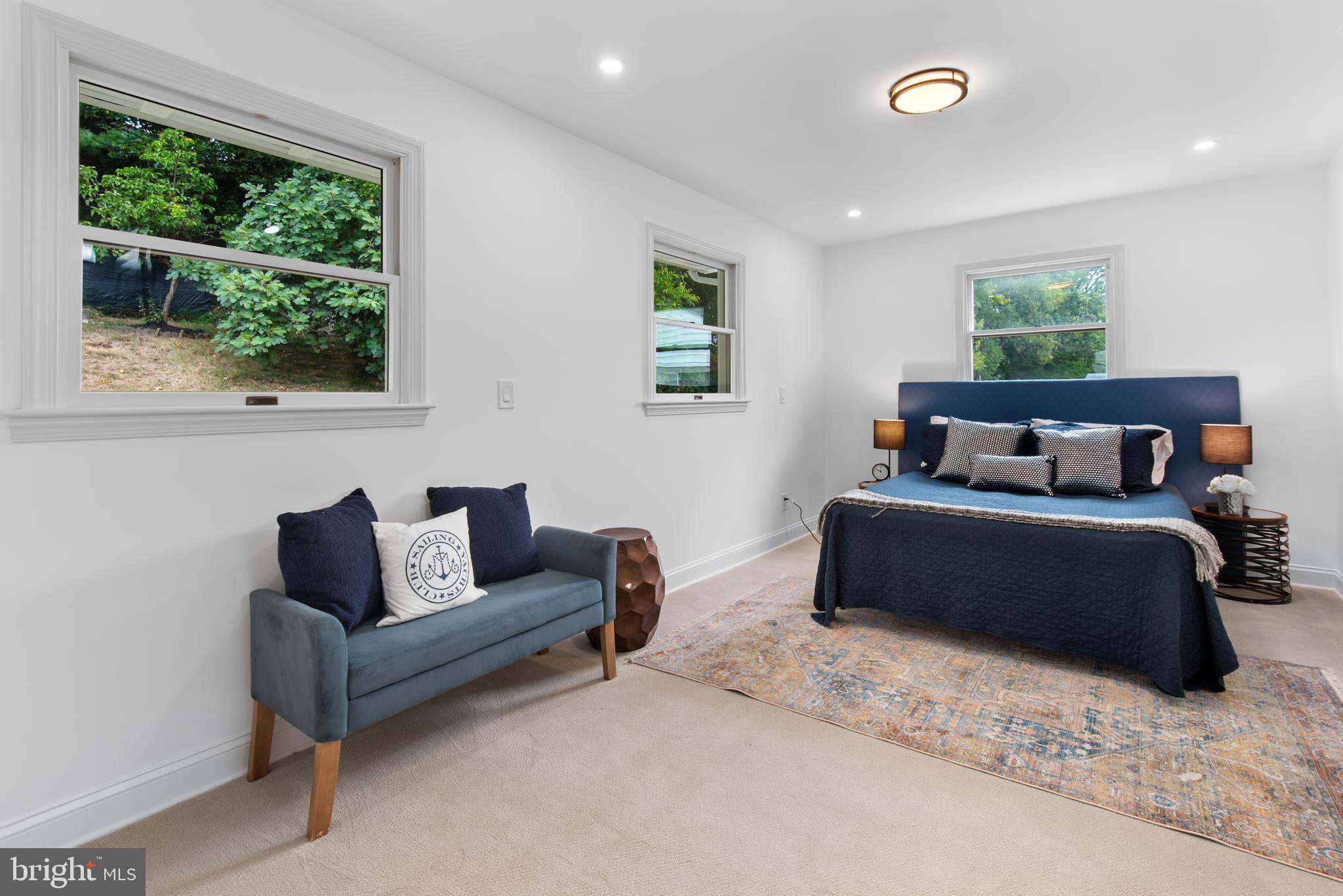2215 Reedie Drive Silver Spring, MD 20902 - Photo 27 of 56 a bedroom with furniture and a window