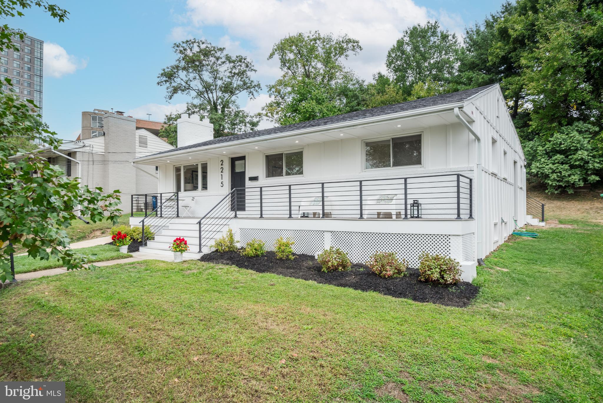 2215 Reedie Drive Silver Spring, MD 20902 - Photo 4 of 56 a front view of a house with a yard