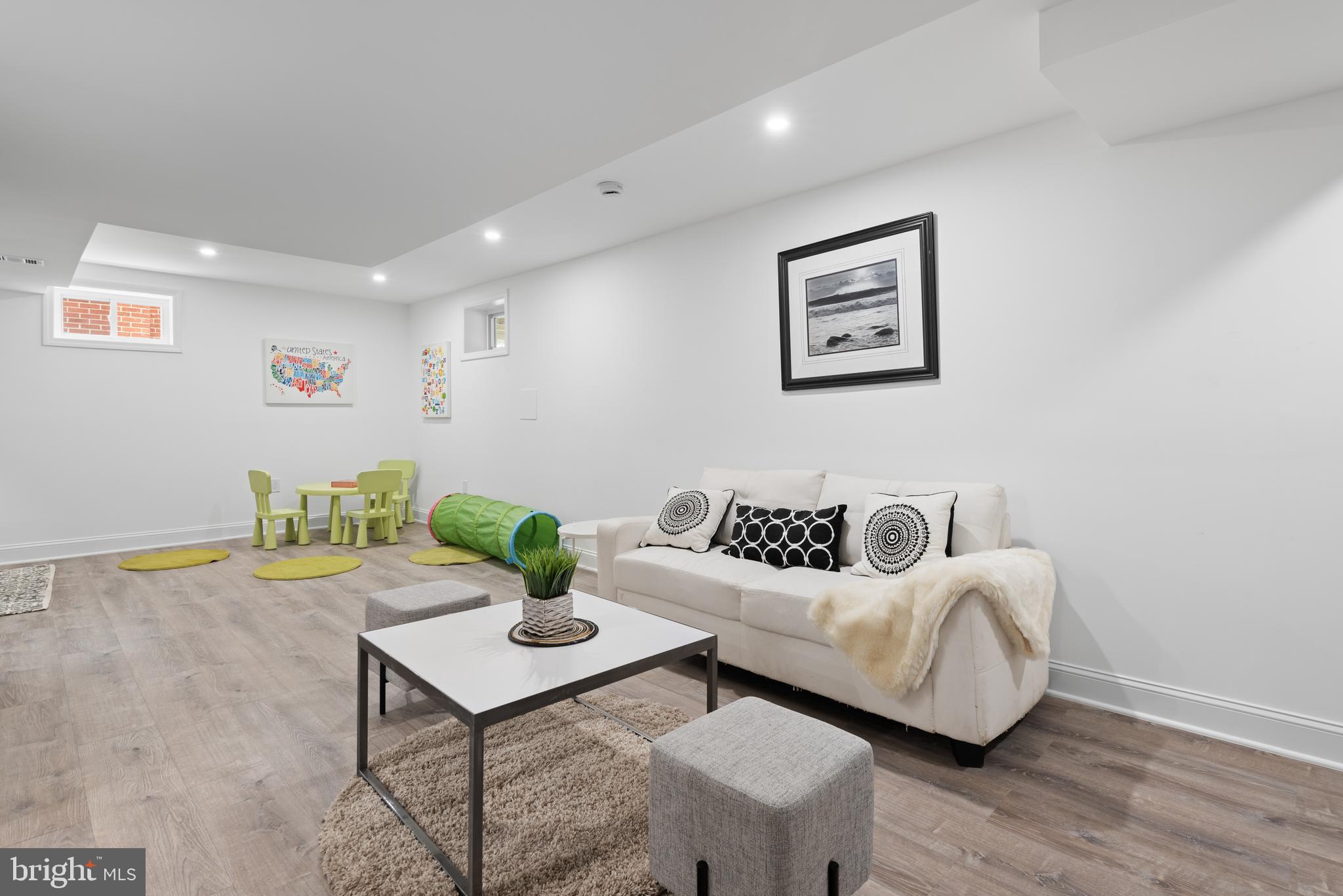 2215 Reedie Drive Silver Spring, MD 20902 - Photo 41 of 56 a living room with furniture and wooden floor