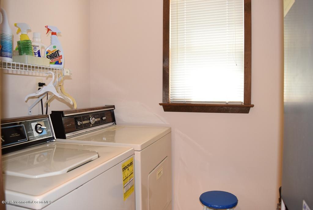40 Compass Road Waretown, NJ 08758 - Photo 14 of 38 a utility room with dryer and washer