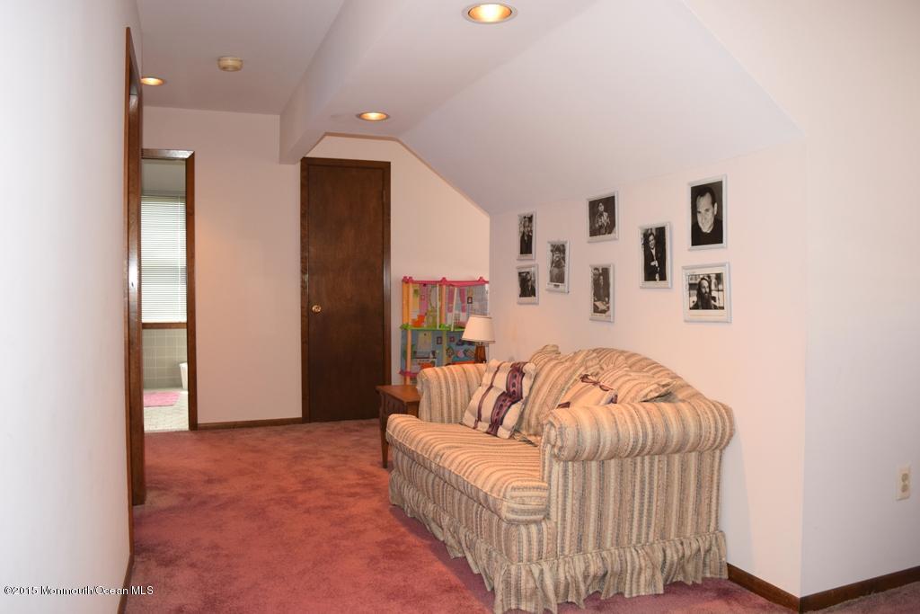 40 Compass Road Waretown, NJ 08758 - Photo 15 of 38 a living room with furniture and a couch