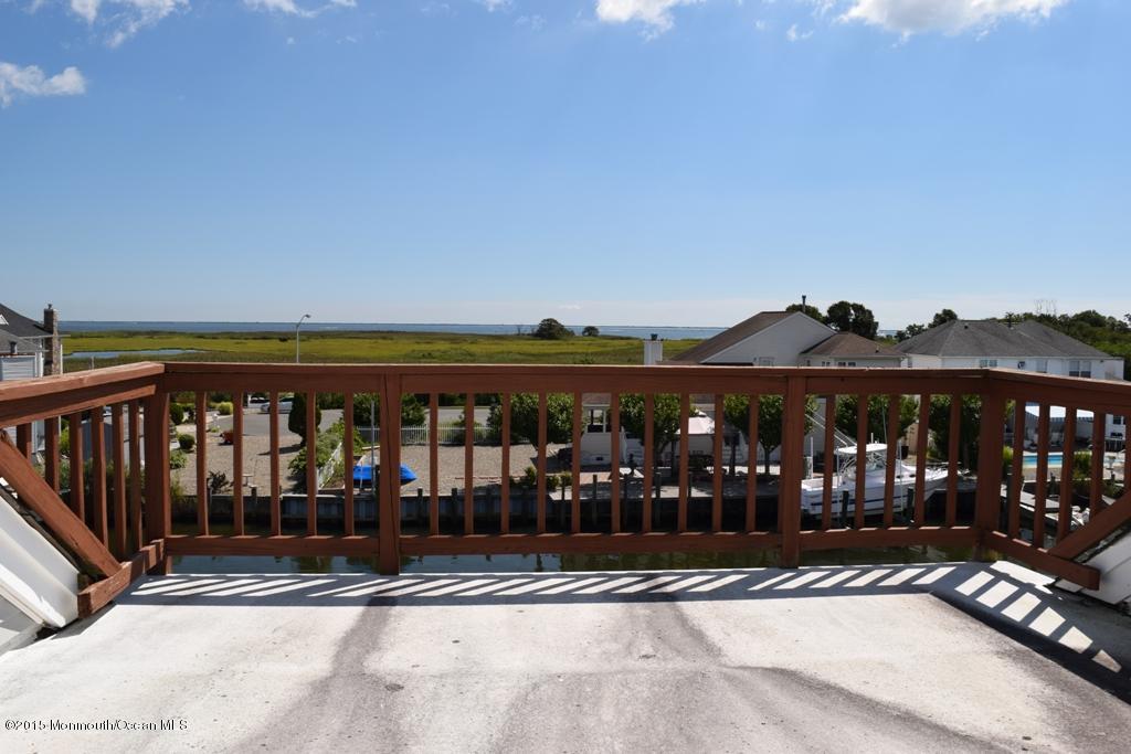 40 Compass Road Waretown, NJ 08758 - Photo 28 of 38 a view of building from the balcony