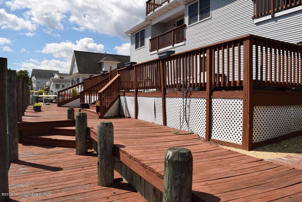 40 Compass Road Waretown, NJ 08758 - Photo 31 of 38 a view of outdoor space with deck and furniture
