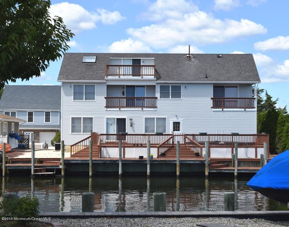 40 Compass Road Waretown, NJ 08758 - Photo 36 of 38 a front view of a house with balcony
