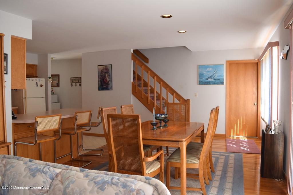 40 Compass Road Waretown, NJ 08758 - Photo 8 of 38 a dining room with furniture and wooden floor