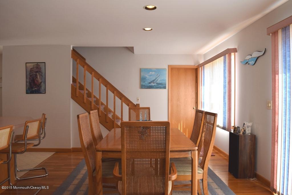 40 Compass Road Waretown, NJ 08758 - Photo 10 of 38 a view of a dining room with furniture and a window