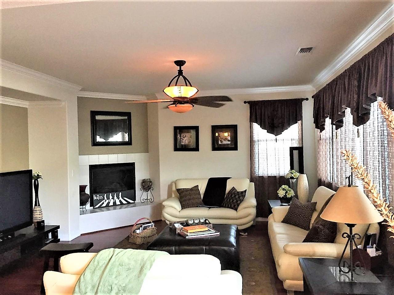 3532 Keystone Loop Discovery Bay, CA 94505 - Photo 11 of 37 a living room with furniture and a fireplace