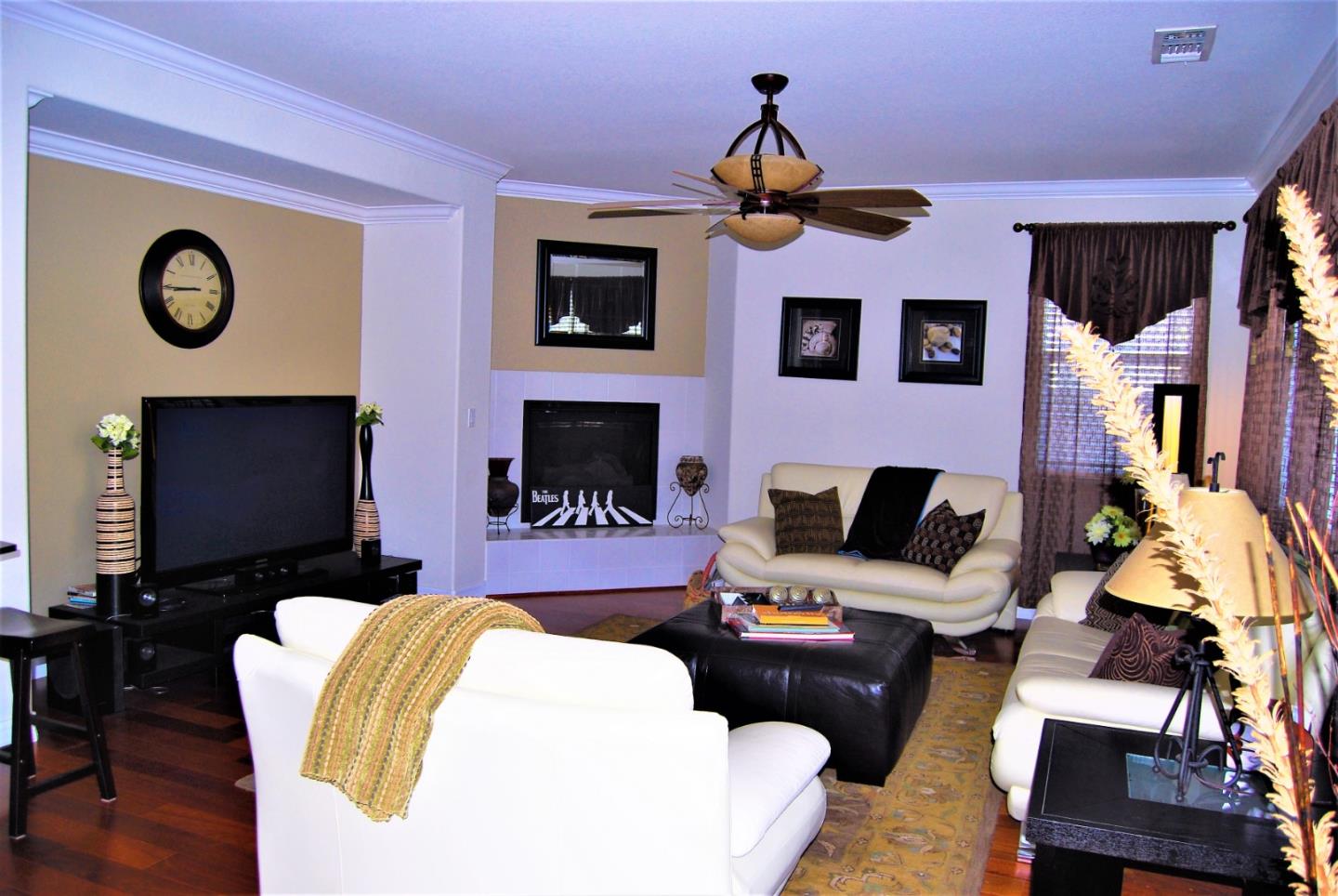 3532 Keystone Loop Discovery Bay, CA 94505 - Photo 13 of 37 a living room with furniture and a flat screen tv