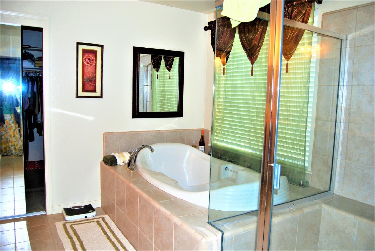 3532 Keystone Loop Discovery Bay, CA 94505 - Photo 20 of 37 a bathroom with a tub and a sink