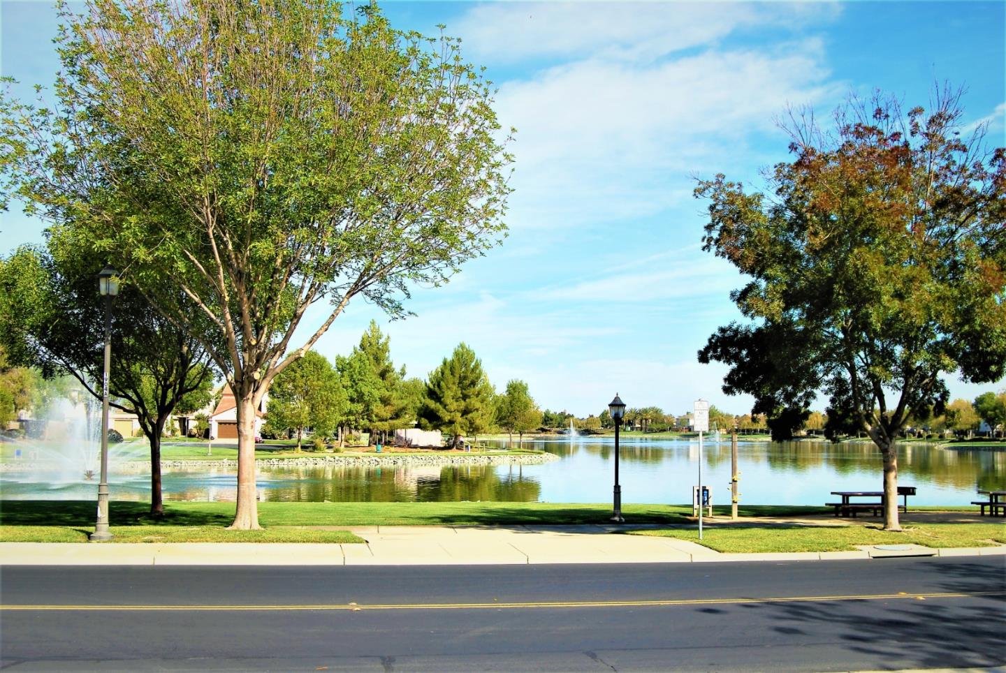 3532 Keystone Loop Discovery Bay, CA 94505 - Photo 35 of 37 a view of swimming pool and trees in the background