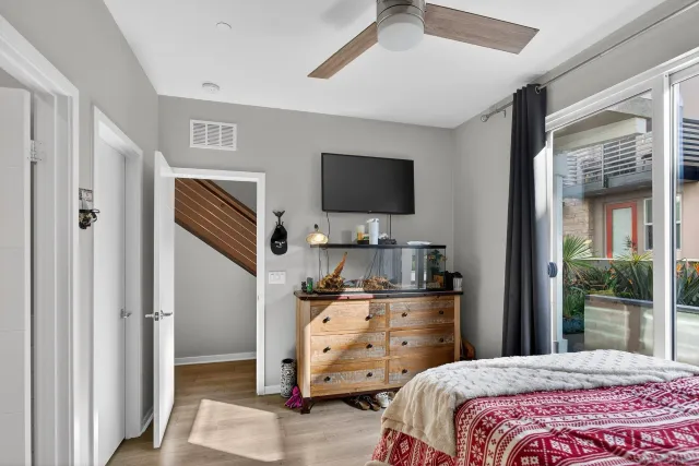 a bathroom with a sink mirror toilet and vanity
