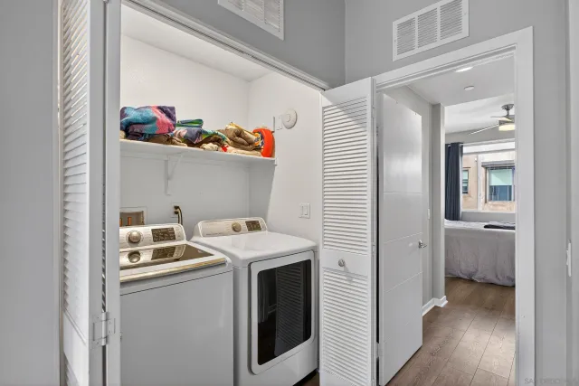 a bedroom with a bed and a tv