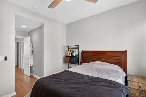 a bathroom with a sink mirror and toilet