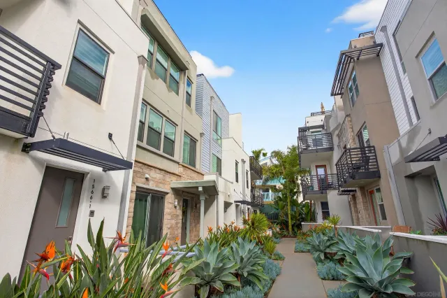 a view of a swimming pool with outdoor seating