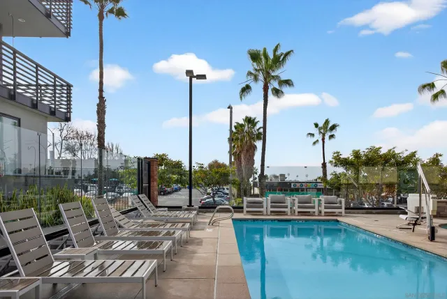 a view of a swimming pool with a patio