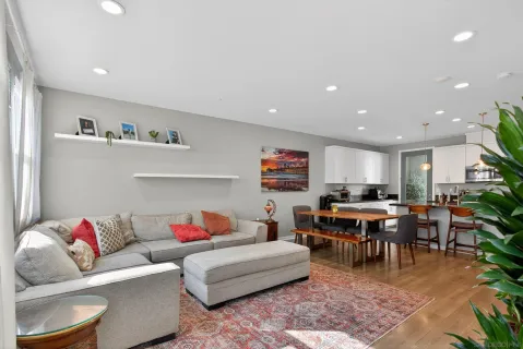 a living room with furniture and a couch