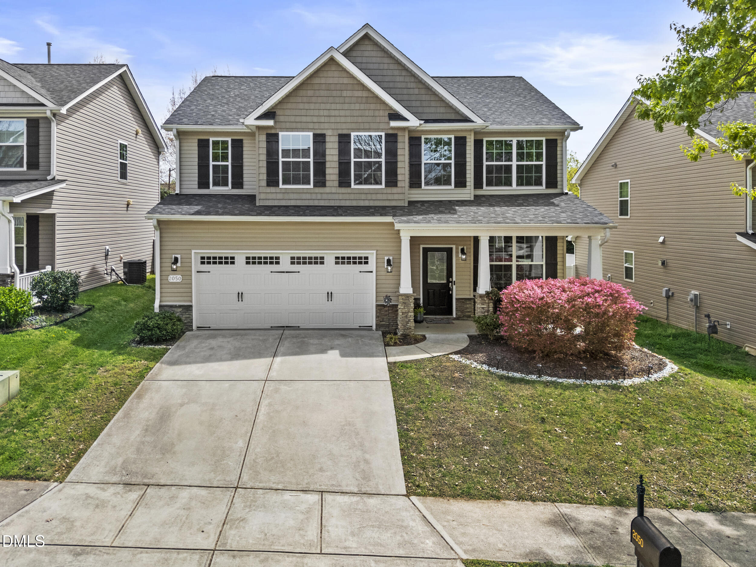 2050 Sinclair Burlington, NC 27215 - Photo 1 of 17 a front view of a house with a yard